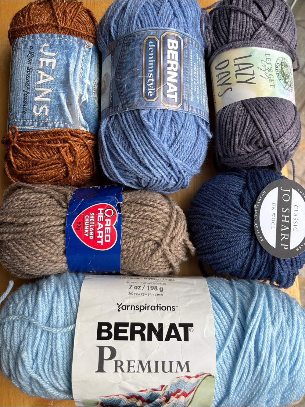 Six skeins of assorted yarn